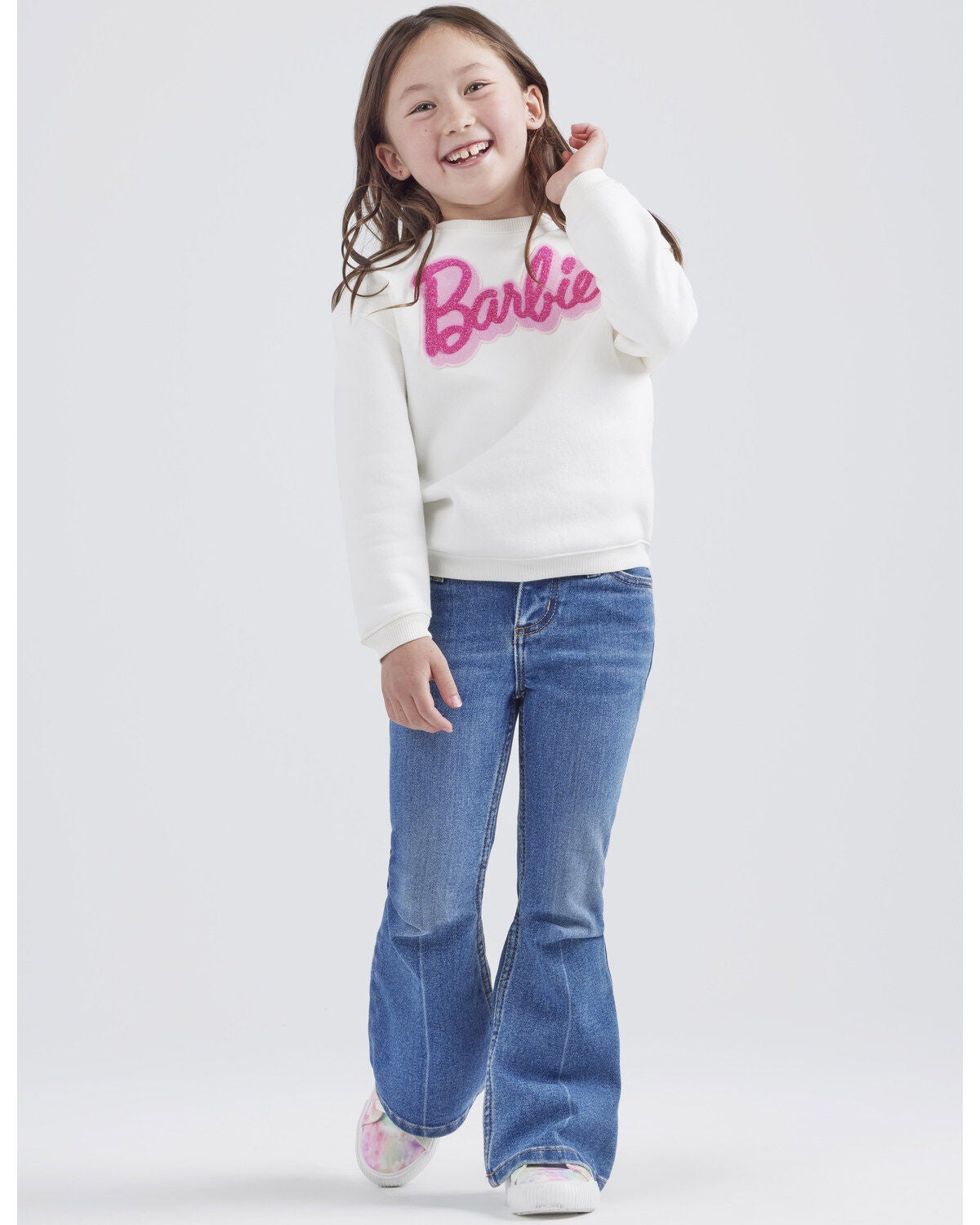 Image #1 - Wrangler&reg; X Barbie&trade; Girls' Medium Wash Mid Rise Pink Patch Stretch Flare Jeans, Medium Wash, hi-res