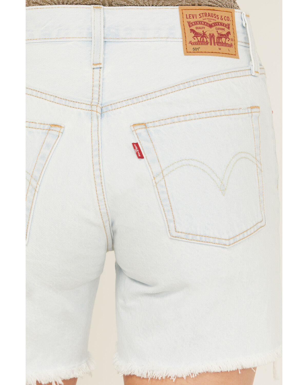 Product Name:  Levi's Women's 501® Fade Off Light Wash High Rise Mid Thigh Denim Shorts