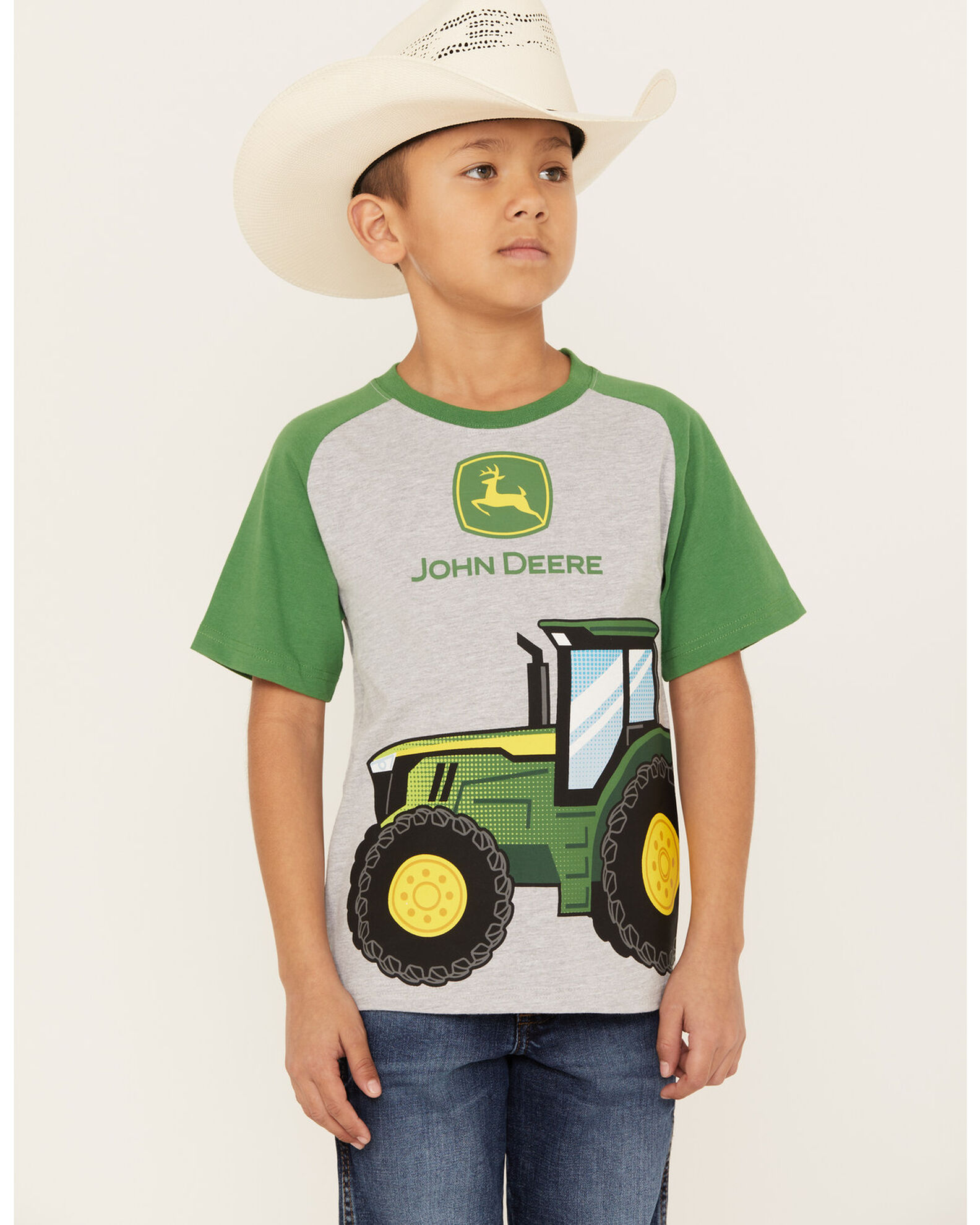 Little boy on john deere tractor sales