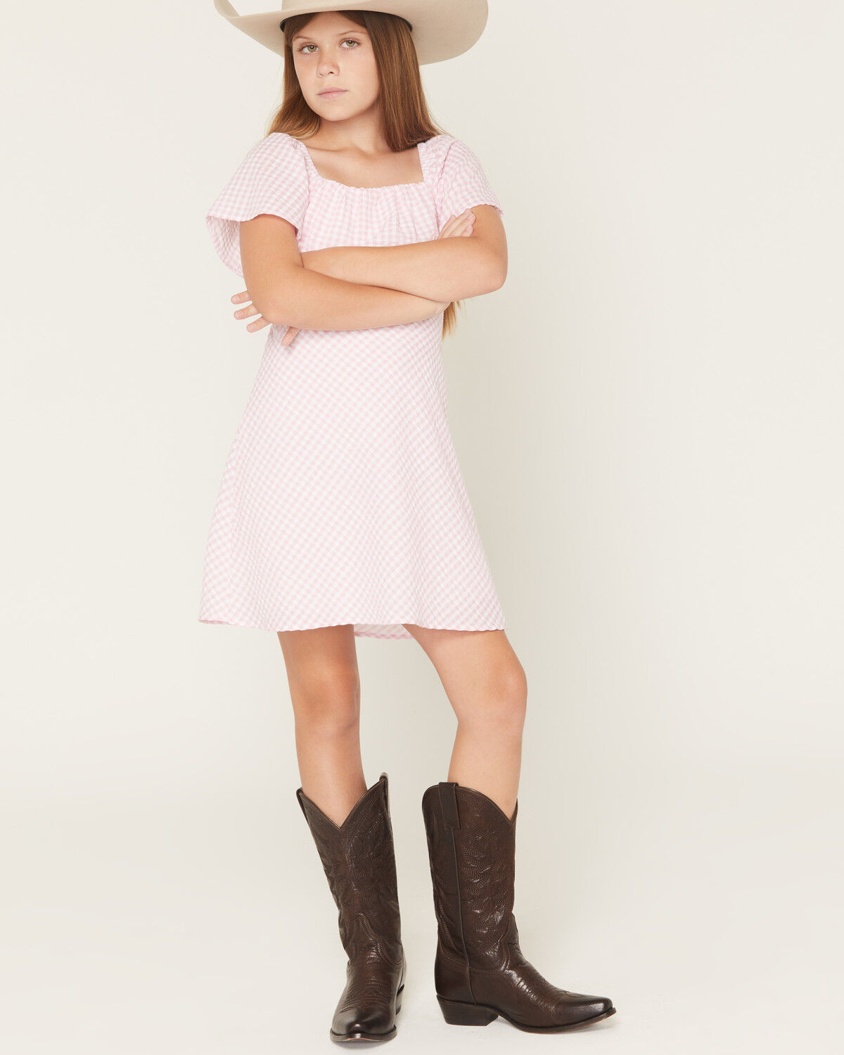 The product is a pink dress specifically designed for girls, matching the keyword perfectly.