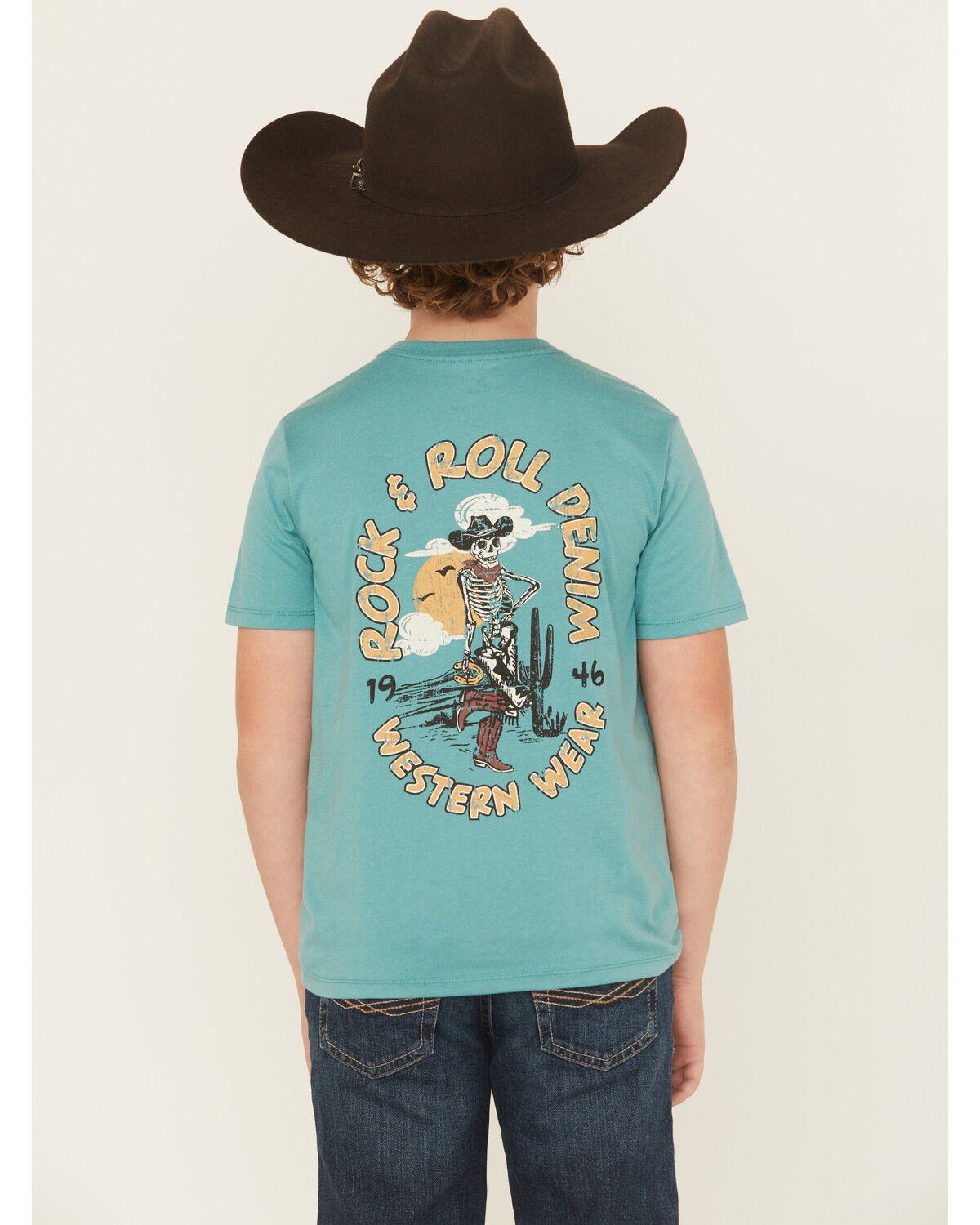 The product is a boys' shirt that is specifically teal in color and fits the description of a stretch shirt.