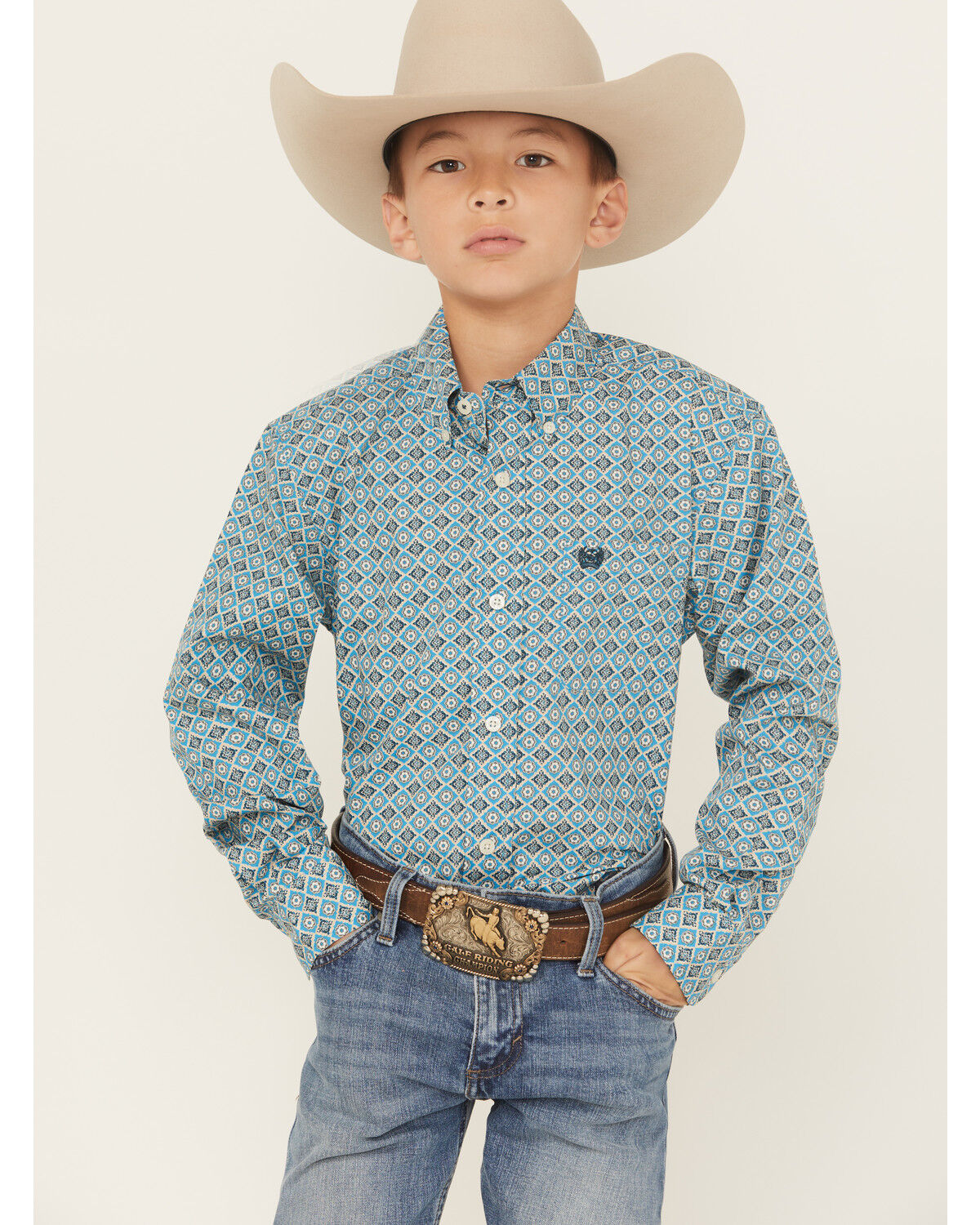 The product is a long sleeve shirt in a turquoise color, which aligns well with the keyword, but it is not specifically a stretch shirt.