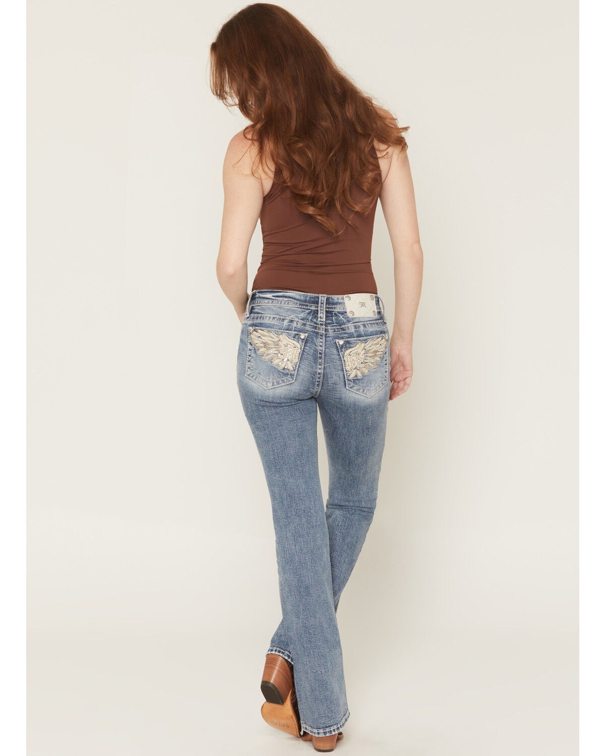 Women's Miss Me Medium Wash Mid Rise Logo Pocket Bootcut Stretch Denim