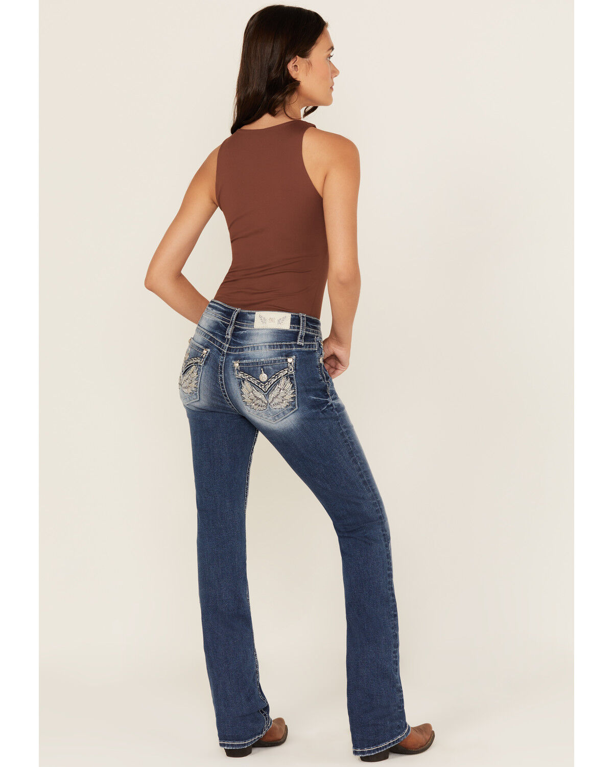 Women's Miss Me Medium Wash Mid Rise Winged Pocket Bootcut Stretch Den