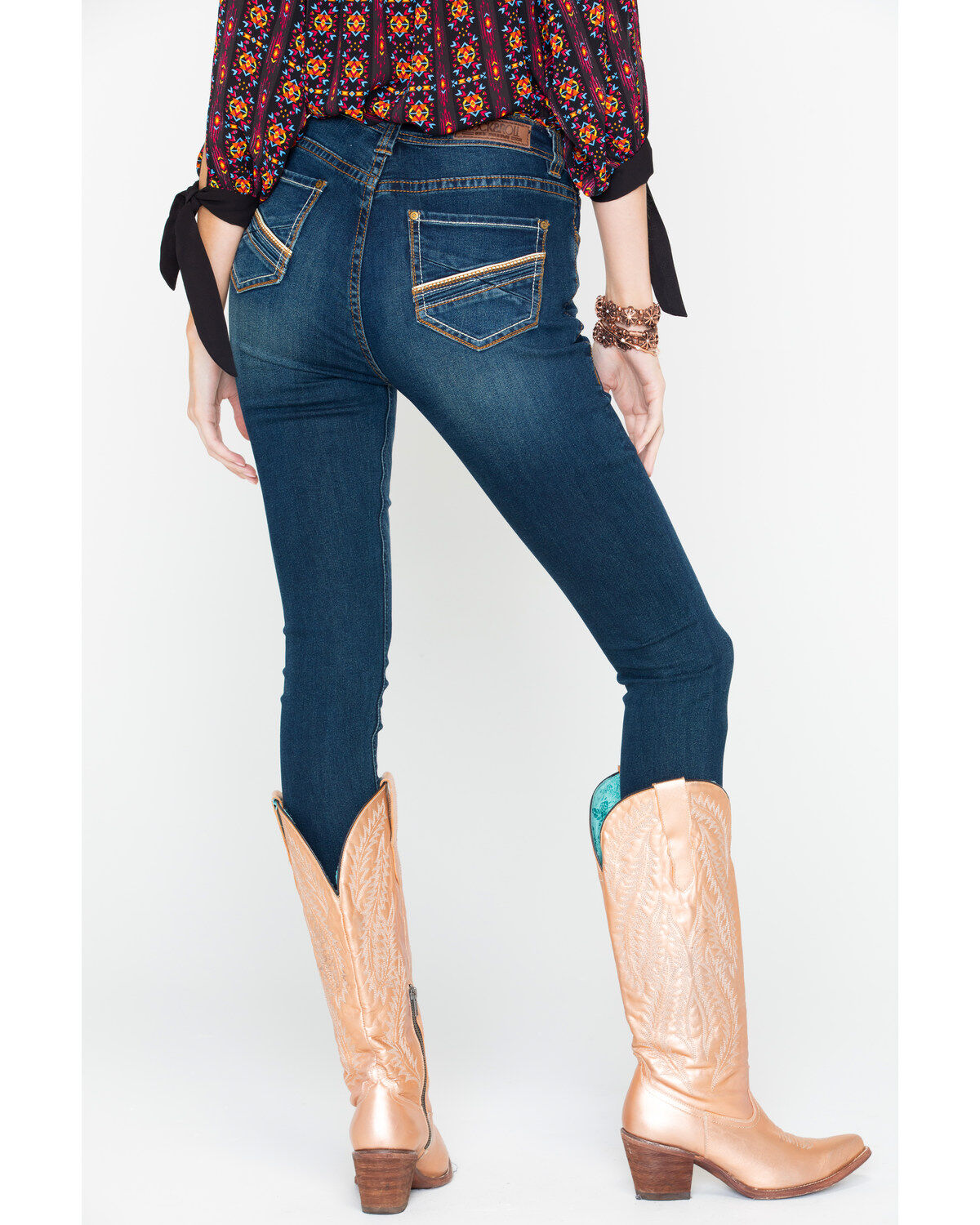 cowgirl boots and jeans