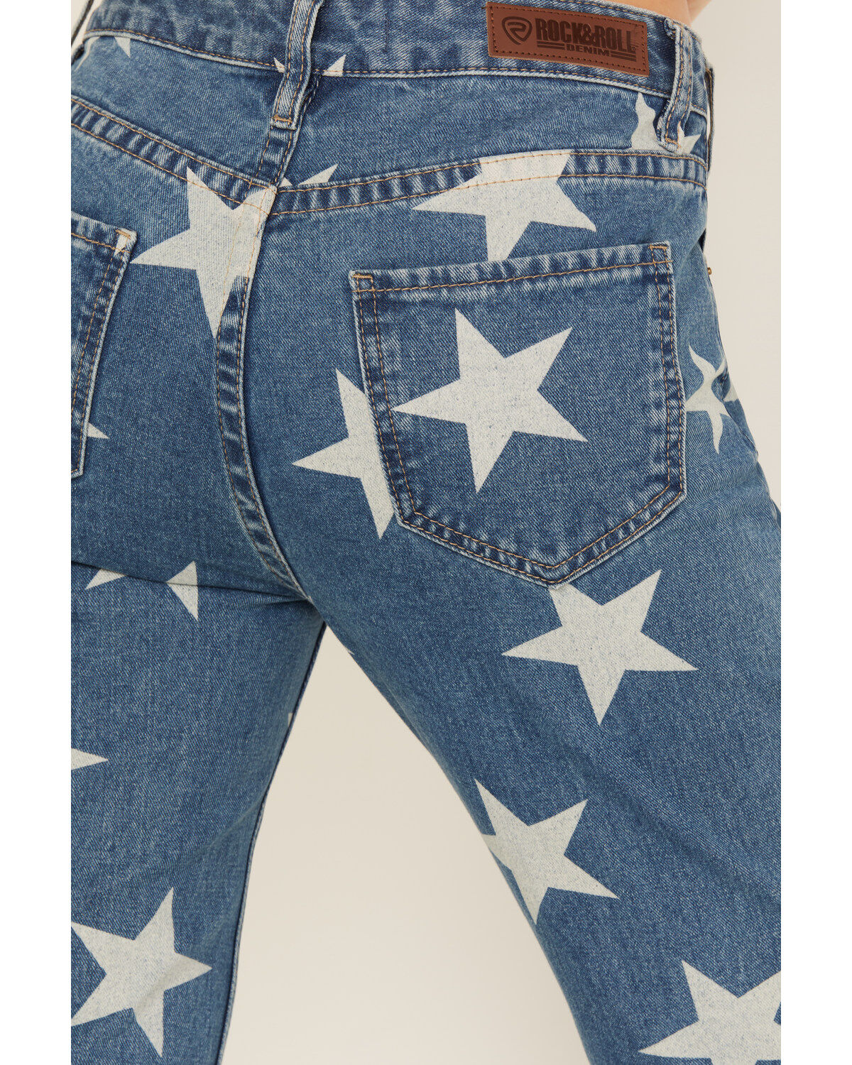 Product Name:  Rock & Roll Denim Women's Light Wash High Rise Star Print Americana Slit Flare Jeans