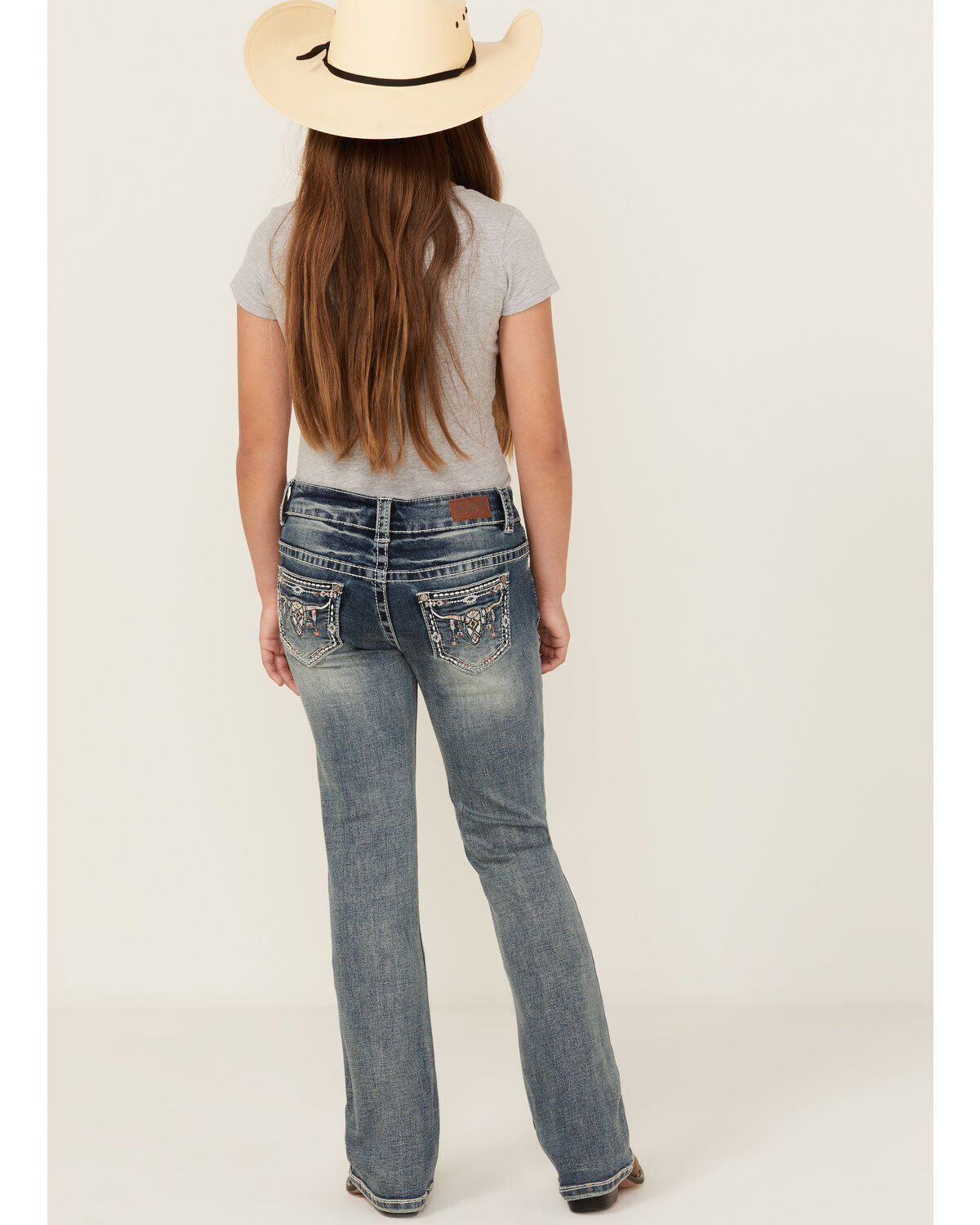 Product Name:  Shyanne Girls' Light Wash Steer Head Pocket Bootcut Stretch Denim Jeans