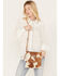Image #1 - Idyllwind Women's Canyon Ridge Hair-On Cowhide Crossbody Bag, Lt Brown, hi-res