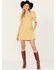 Image #1 - Free People Women's Cheyenne Denim Mini Dress, Yellow, hi-res