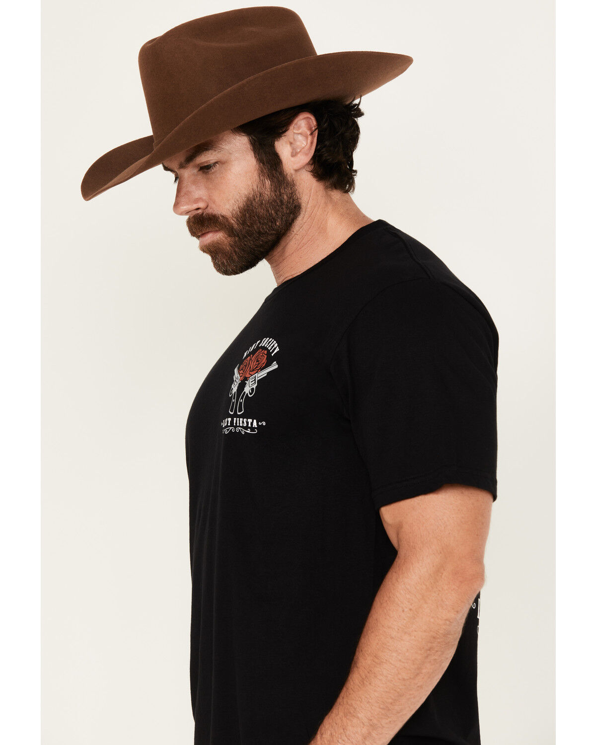 Product Name:  Riot Society Men's Boot Barn Exclusive Fiesta Cowgirl Short Sleeve Graphic T-Shirt