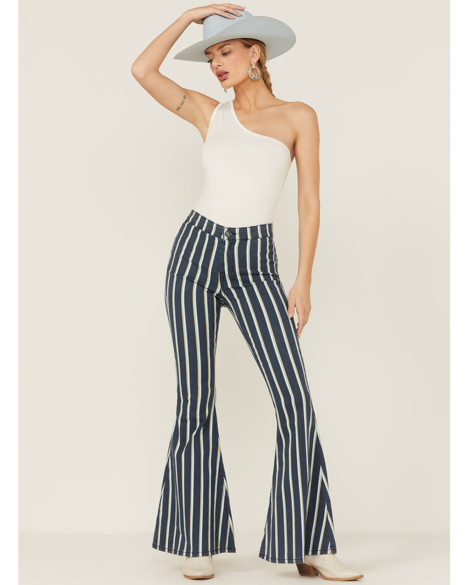 Women's striped bell bottom pants sales