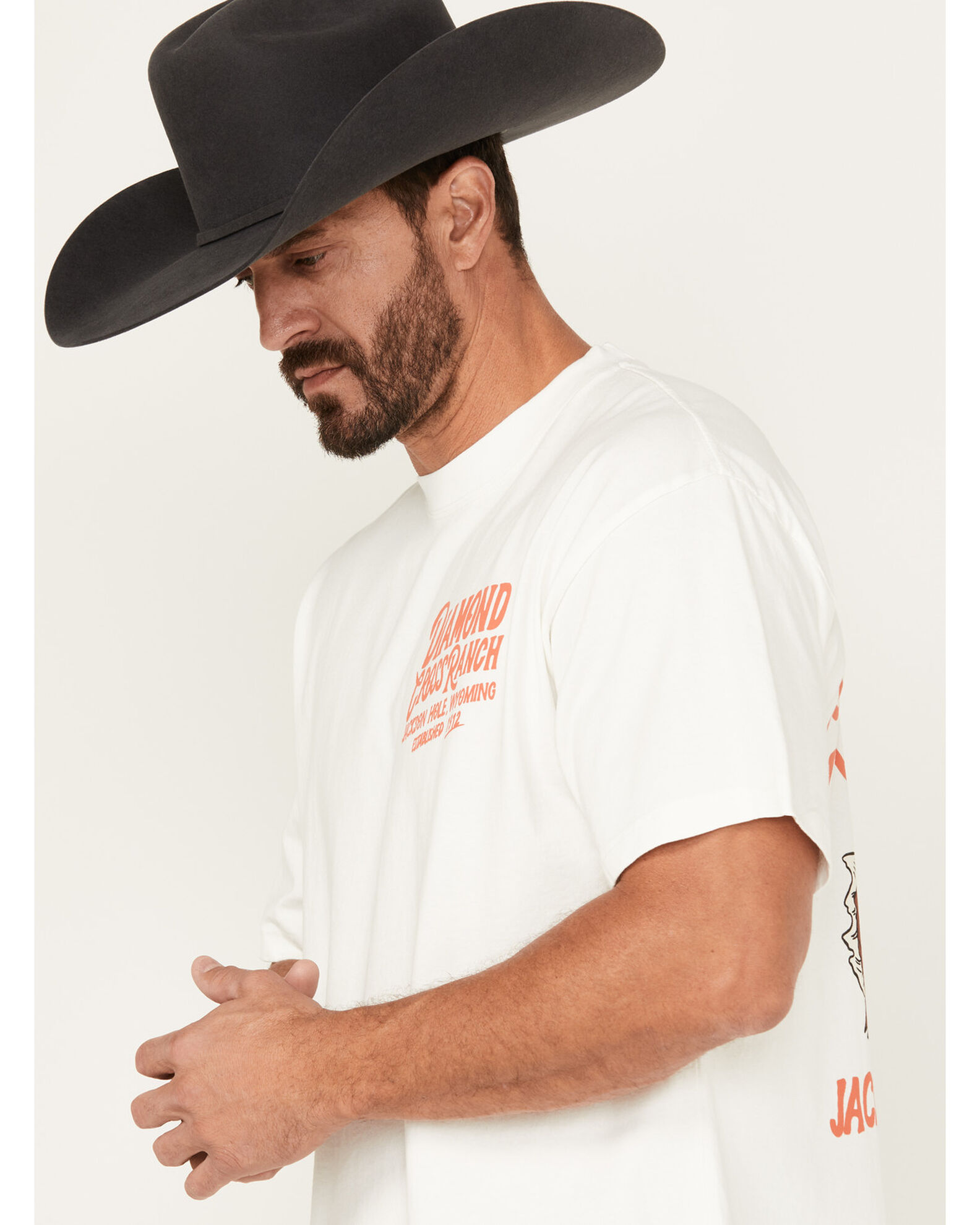 Product Name:  Diamond Cross Ranch X Wrangler Men's Buck Yeah Short Sleeve Graphic T-Shirt
