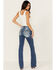 Image #1 - Miss Me Women's Medium Wash Mid Rise Border Flap Pocket 34" Bootcut Stretch Denim Jeans, Medium Wash, hi-res