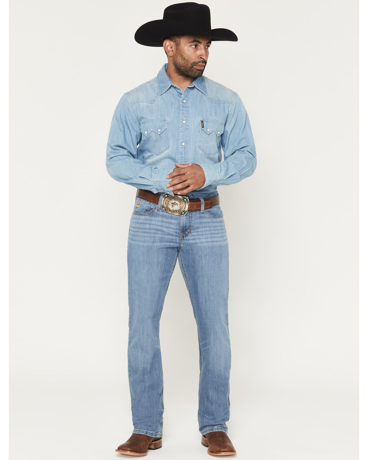 Image #1 - Cinch Men's Light Wash Ian Slim Bootcut Performance Stretch Denim Jeans, Indigo, hi-res