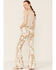 Image #3 - Saints & Hearts Women's Cow Print High Rise Raw Hem Flare Jeans, Taupe, hi-res