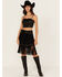Image #1 - Rock & Roll Denim Women's Fringe Buckle Skirt, Black, hi-res
