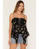 Image #1 - Wild Moss Women's Floral Print Sleeveless Hanky Hem Cami, Black, hi-res