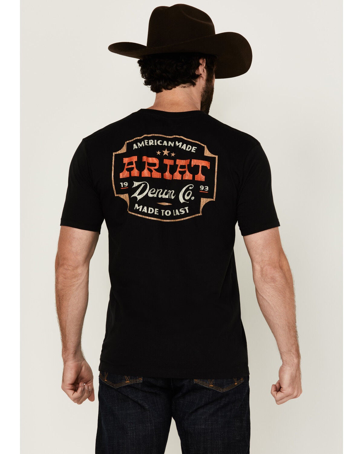 Image #1 - Ariat Men's Denim Badge Logo Short Sleeve Graphic T-Shirt, , hi-res