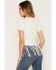 Image #4 - Shyanne Women's Whiskey Fringe Hem Short Sleeve Cropped Graphic Tee, White, hi-res