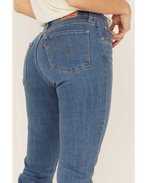 Levi's Women's Medium Wash Mid Rise Classic Straight Jeans | Boot Barn