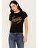 Image #1 - White Crow Women's Whiskey Up Flocked Short Sleeve Graphic Tee, Black, hi-res