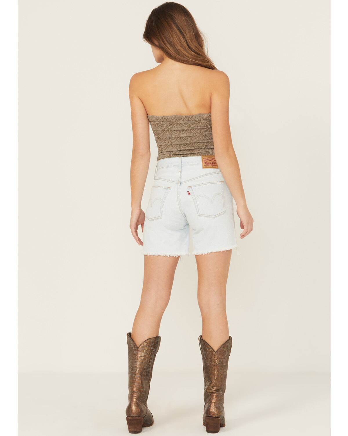 Product Name:  Levi's Women's 501® Fade Off Light Wash High Rise Mid Thigh Denim Shorts