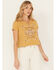 Image #1 - Wild Crow Women's Wild Birds Grommet Short Sleeve Graphic Tee, Mustard, hi-res