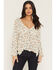 Image #1 - Wild Moss Women's Floral Print Long Sleeve Hanky Hem Top, Ivory, hi-res