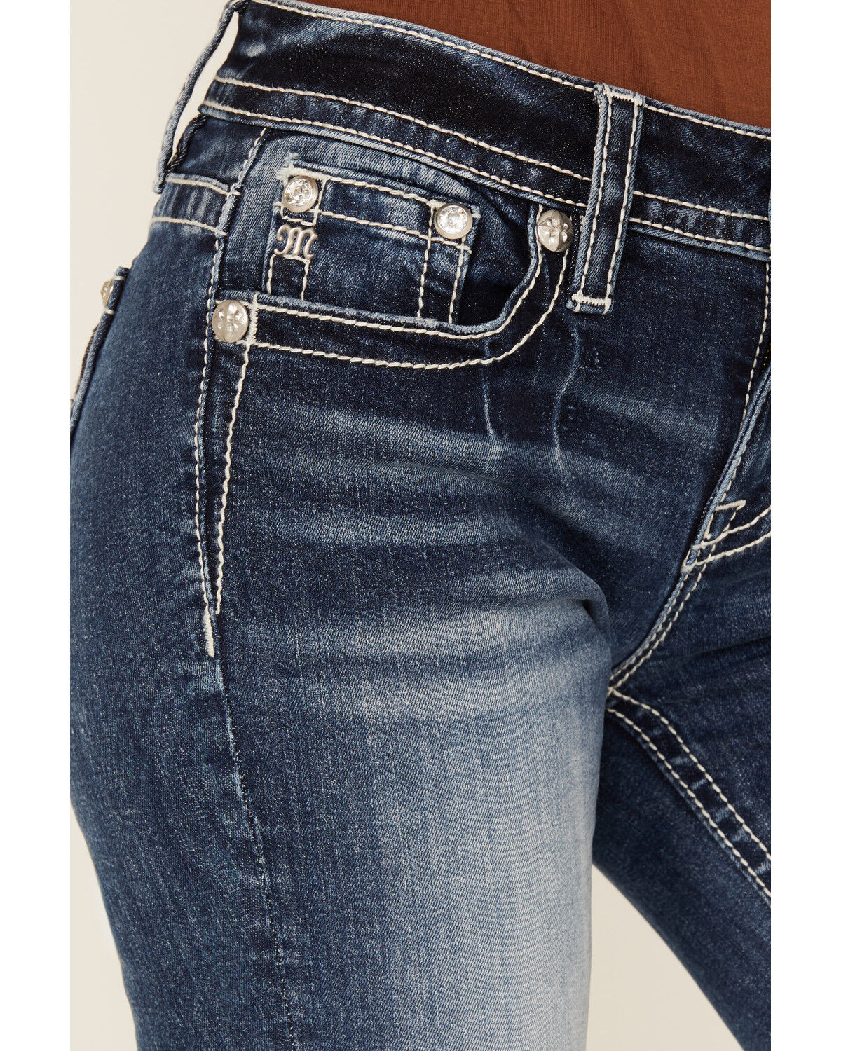 Product Name:  Miss Me Women's Medium Wash Mid Rise Cowhide Steer Head Pocket Bootcut Stretch Denim Jeans