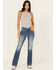 Image #3 - Miss Me Women's Medium Wash Mid Rise Fleur de Lis Pocket 32" Bootcut Stretch Denim Jeans, Medium Wash, hi-res