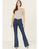 Image #1 - Wrangler X Lainey Wilson Women's Dark Wash High Rise Moonlight Bare Back Pintuck Flare Stretch Denim Jeans, Dark Wash, hi-res