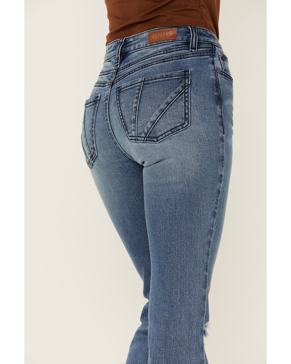 Product Name:  Shyanne Women's Mid Release Hem Side Slit Flare Jeans