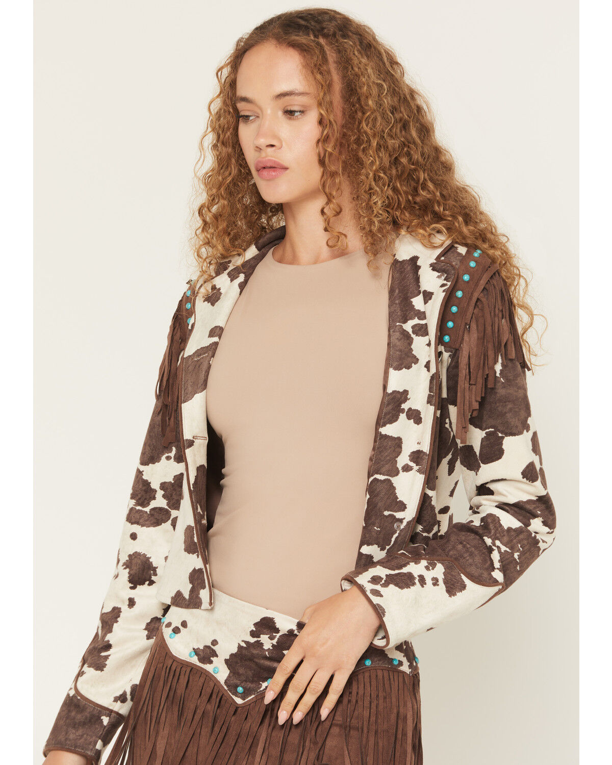 Image #1 - Shyanne Women's Porter Cow Print Faux Suede Embellished Fringe Moto Jacket, Brown, hi-res