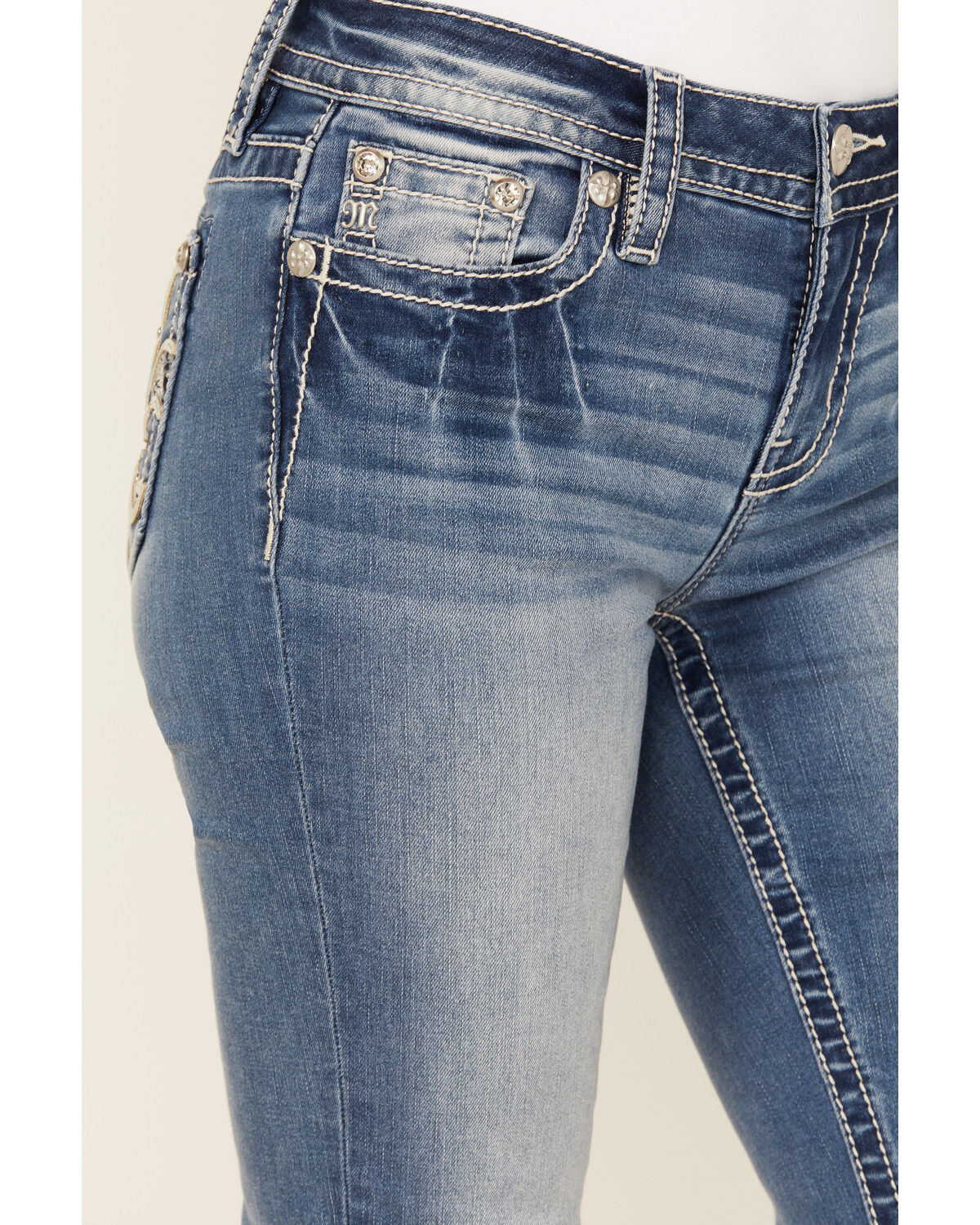 Product Name:  Miss Me Women's Fleur de Lis Medium Wash Mid Rise Bootcut Stretch Denim Jeans