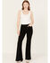 Image #1 - Shyanne Women's High Rise Destructed Super Flare Stretch Jeans, Black, hi-res
