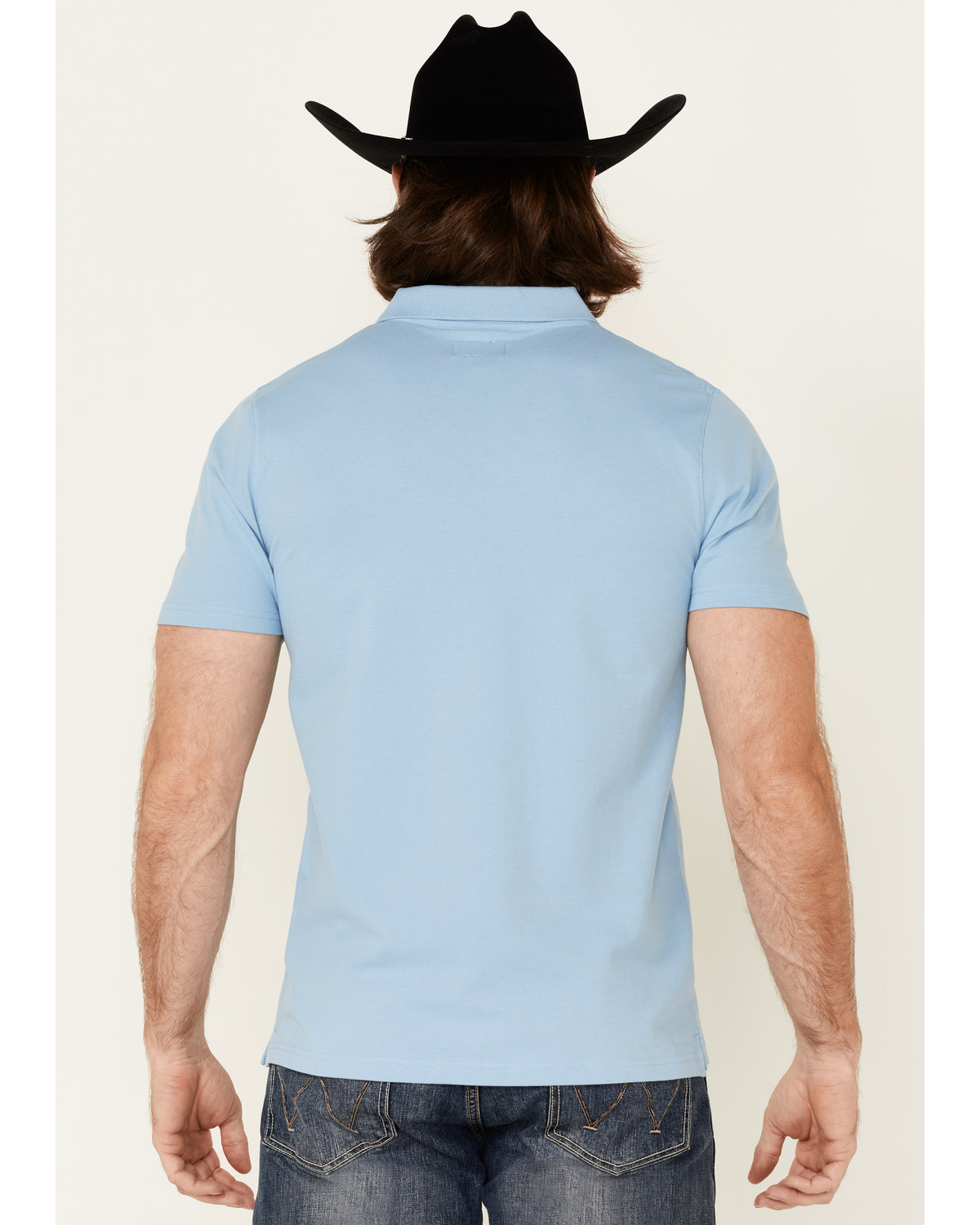 light blue polo and khaki pants