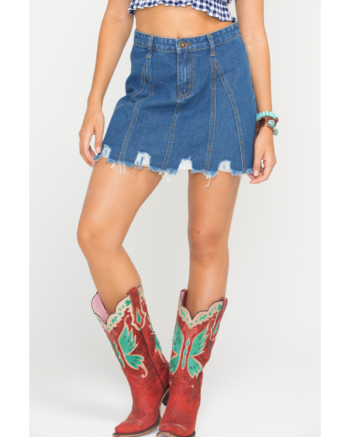 mini skirt and cowboy boots