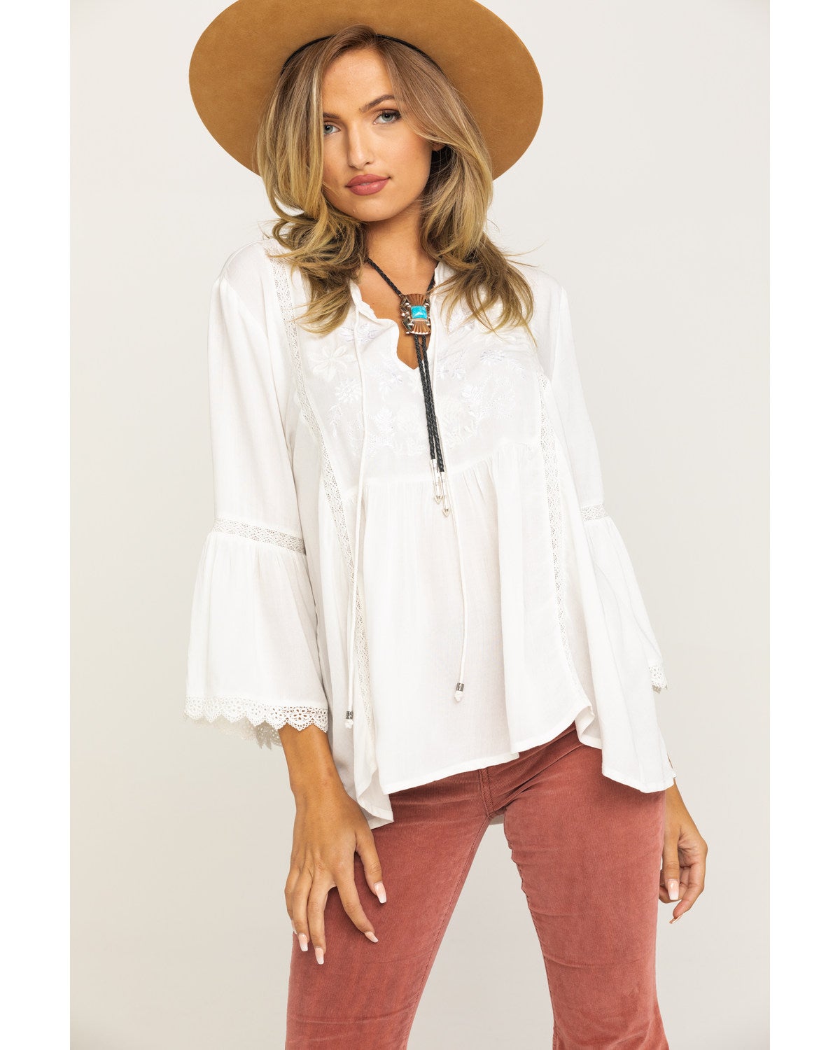 white embroidered peasant top